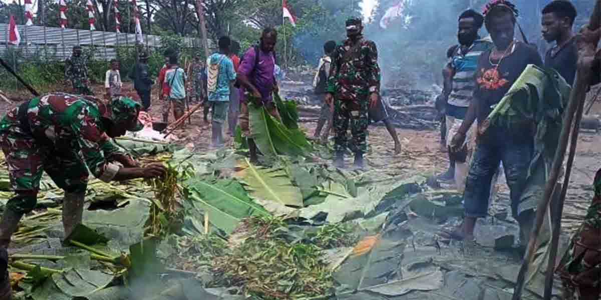 bakar-batu-cara-tni-polri-menyambut-natal-bersama-masyarakat-papua